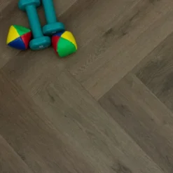 Supremo Luxury Click Vinyl Rigid Core Herringbone Flooring Cacao Brown With Built In Underlay 6mm By 126mm By 630mm